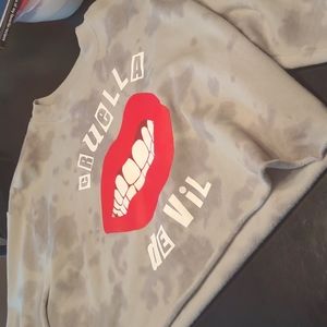 This is a cruella de vil crop top